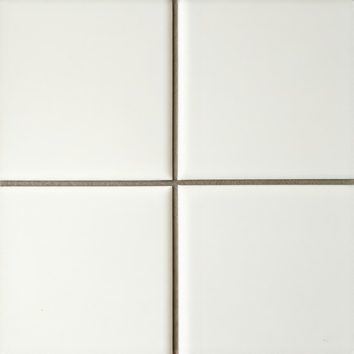 Expert Regrouting in Action with Advanced Waterproof Techniques Close-up image of vintage tile regrouting process using advanced waterproof grout and sealant.