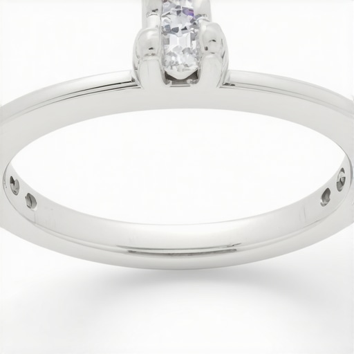 Close-up of a polished silver bezel setting showcasing expert craftsmanship.